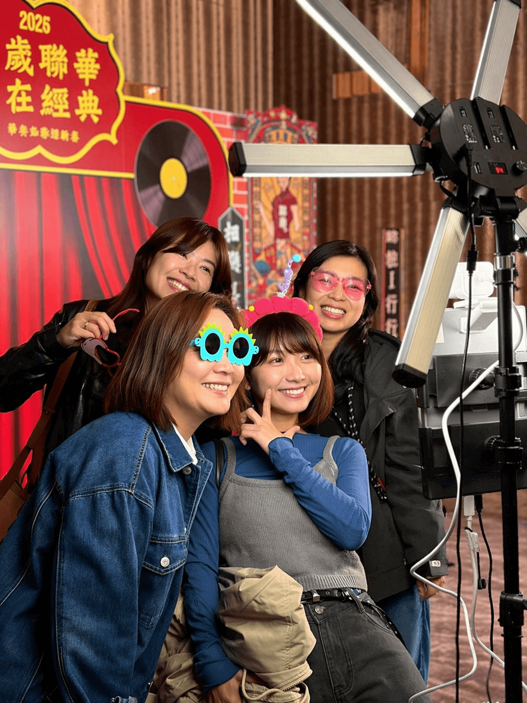 Corporate D&D photo booth group shot with custom-branded frame