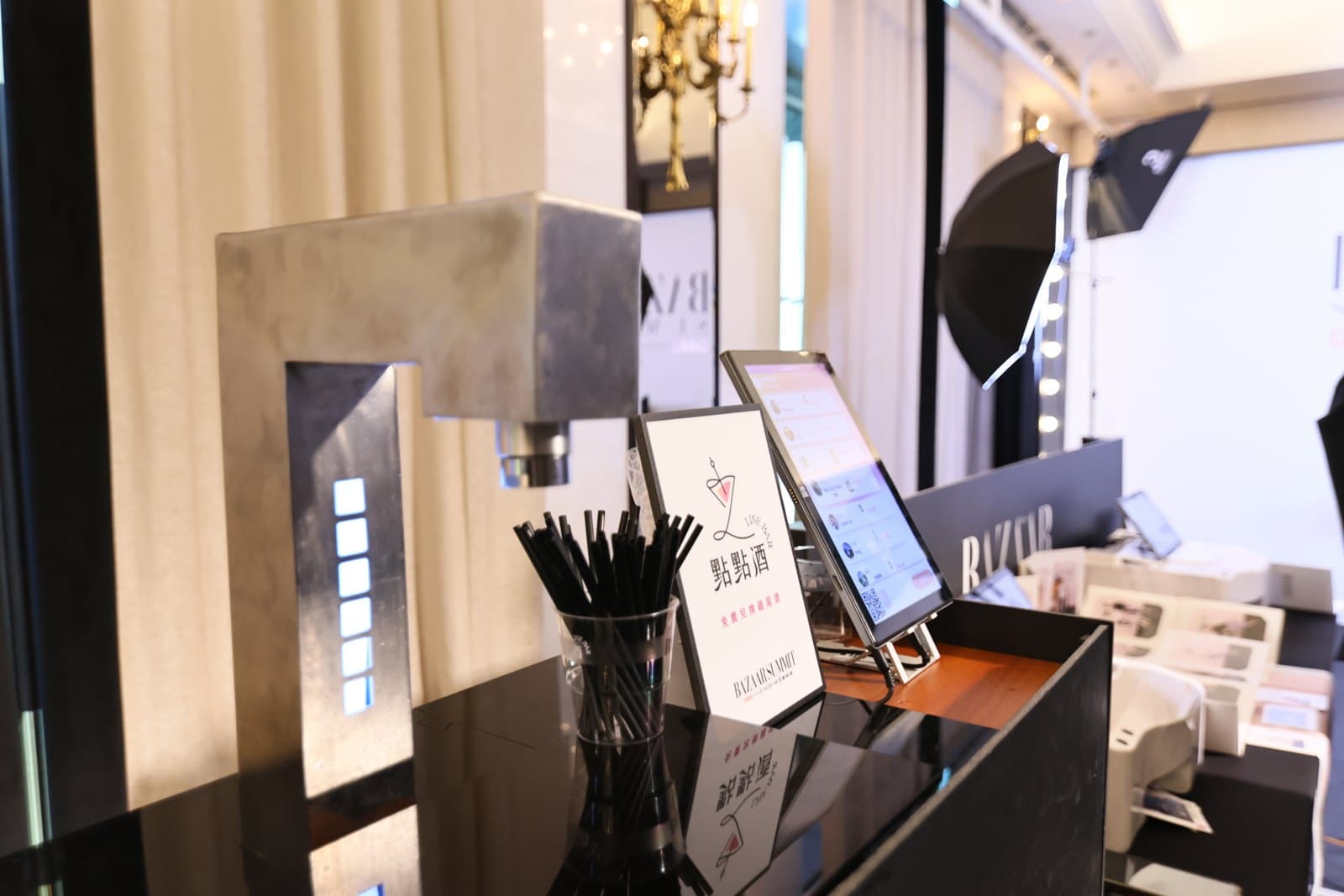 Outdoor brand-event bar: robot bartender, menu stand and scan-to-order in a row