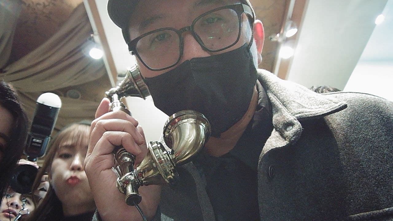 A guest picks up the retro handset to record a message