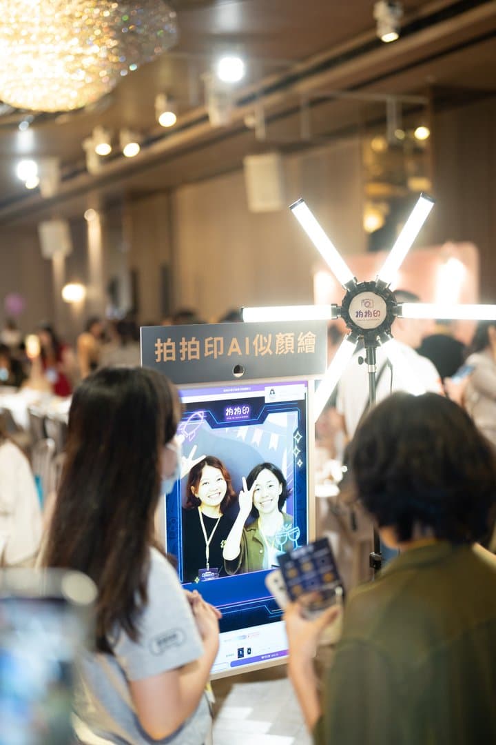 Guests trying the booth on site, portraits generated live